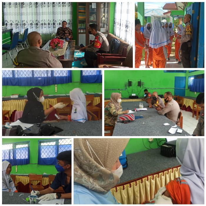 Polsek Sitinjau Laut Lakukan Vaksinasi Covid-19 di Mts N 5 Kerinci
